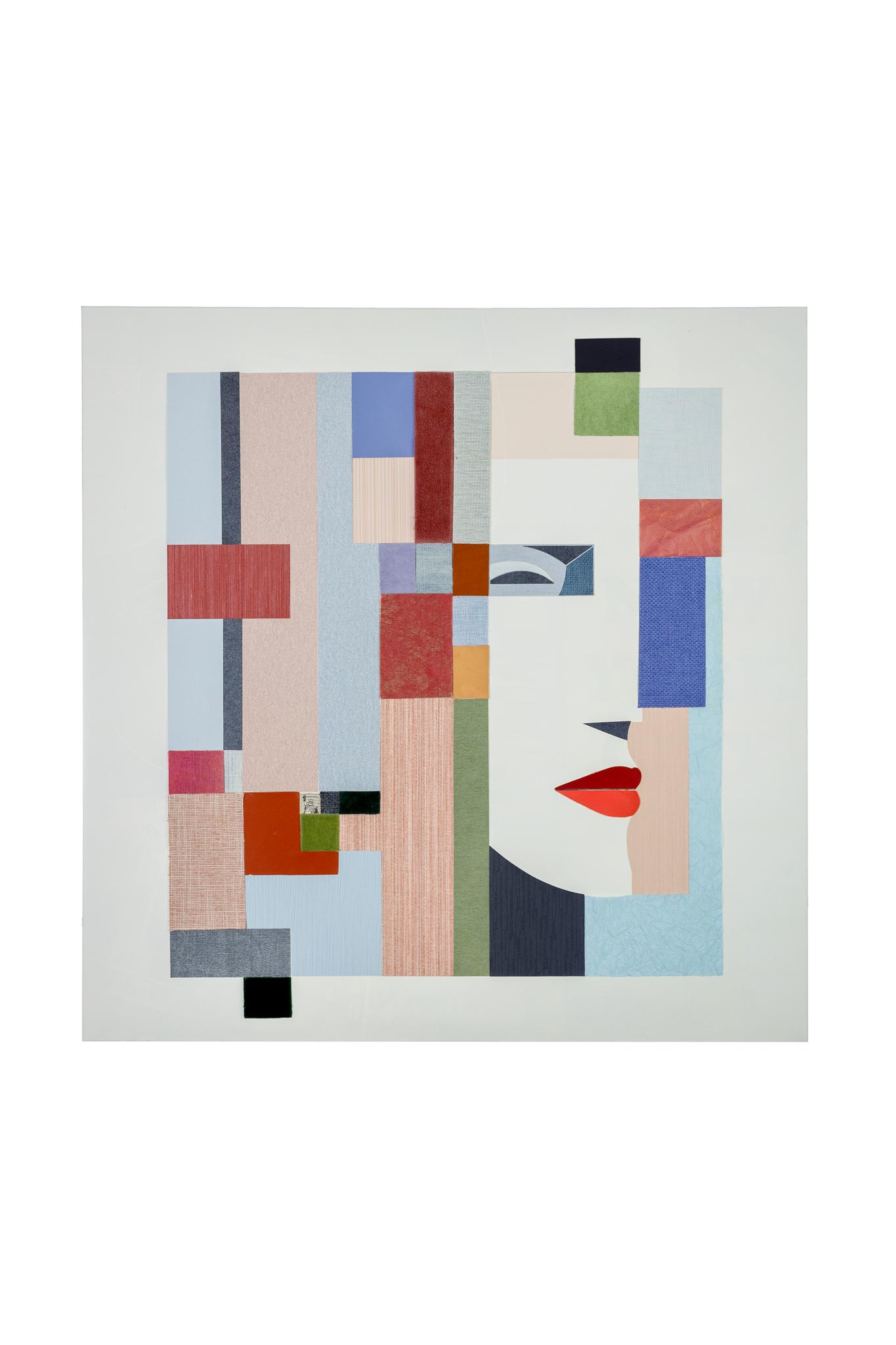 Collage wall piece made from reclaimed textiles and wallpaper