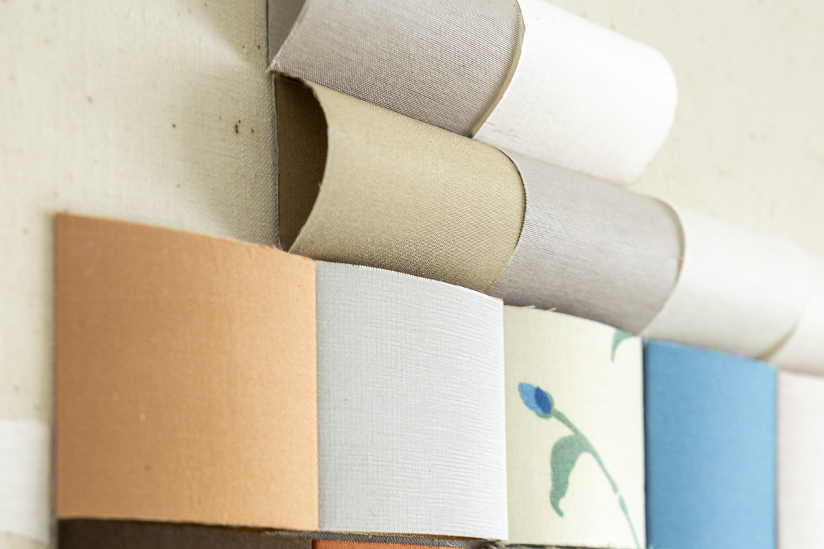 Close-up of fragments and patterned fabrics from reclaimed textiles