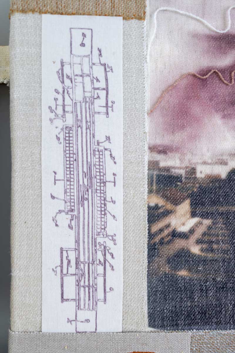 Detail of layered repurposed fabrics and industrial drawing fragments.