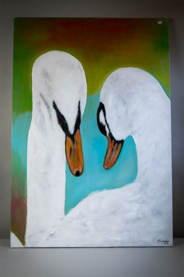 Reused picture frame with textile and paper fragments