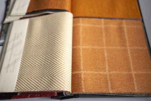 sample book of old upholstery textiles