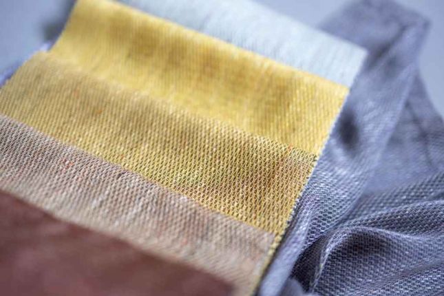 Close-up of sustainable wall art created from upcycled corporate materials